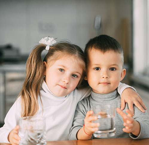 Children drinking quality water